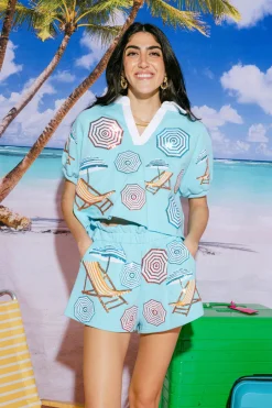 Light Blue Umbrella & Chair White Collar Top