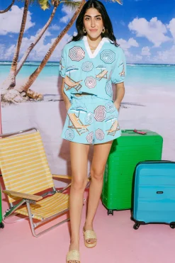 Light Blue Umbrella & Chair White Collar Top