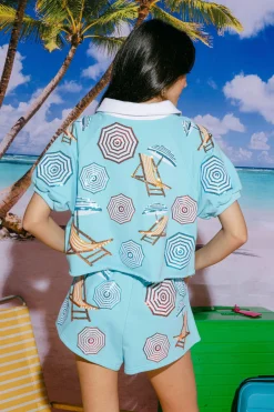 Light Blue Umbrella & Chair White Collar Top