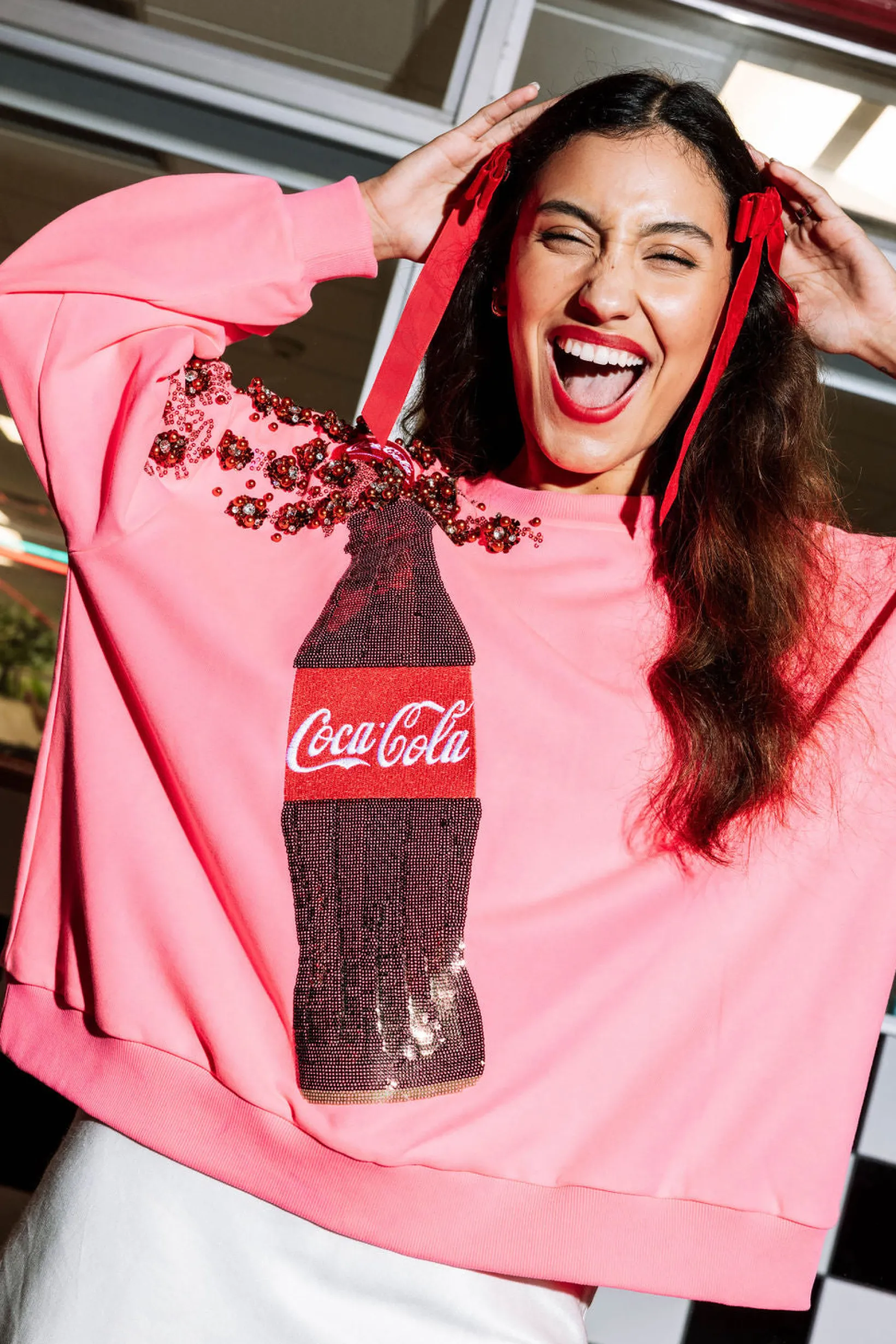 Neon Pink Popping Coca-Cola® Bottle Sweatshirt