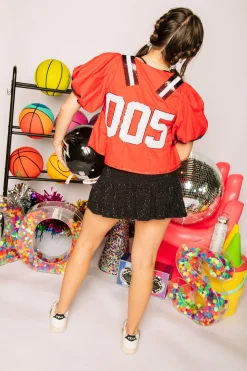 Red & Black QOS Jersey Peplum Top